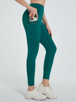 Side view of pocket on greenHigh Waist Active Leggings 