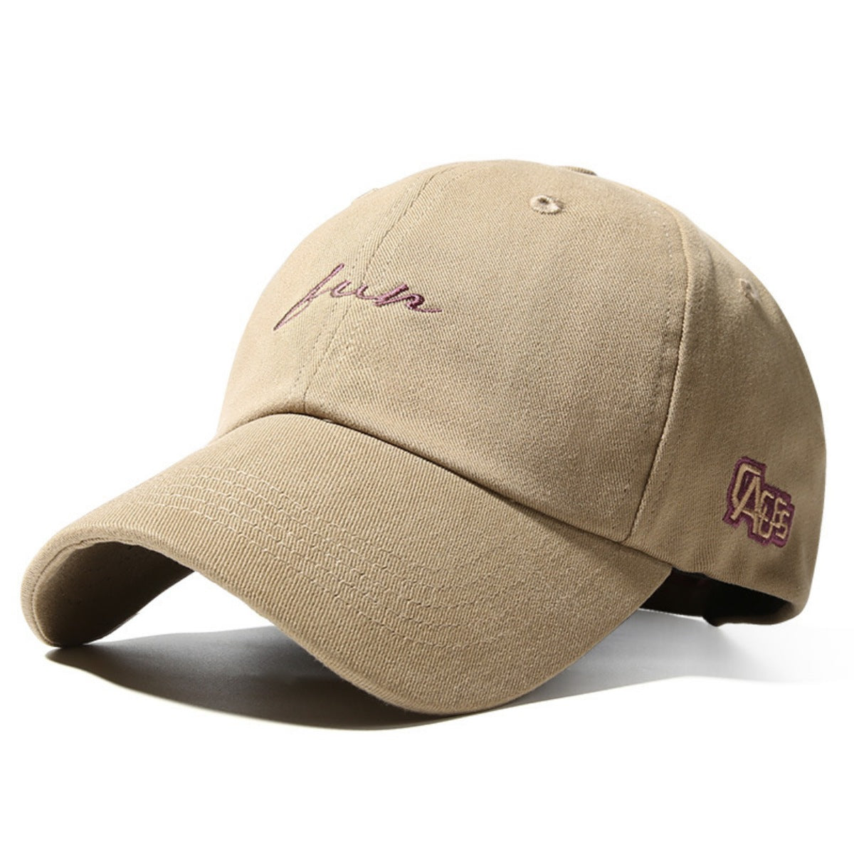Beige cap with embroidered text on a white background