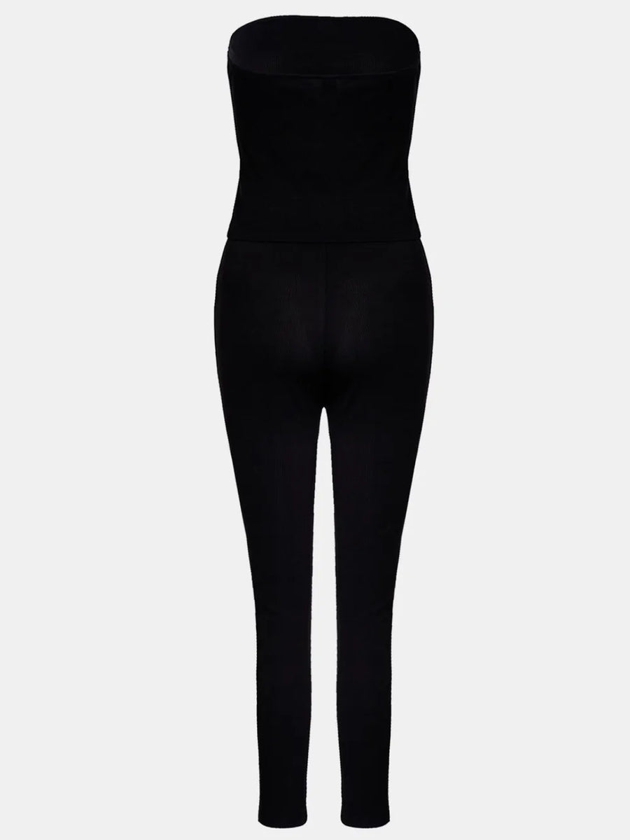 Black strapless jumpsuit on a white background