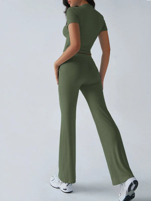 Person wearing a green jumpsuit on a white background