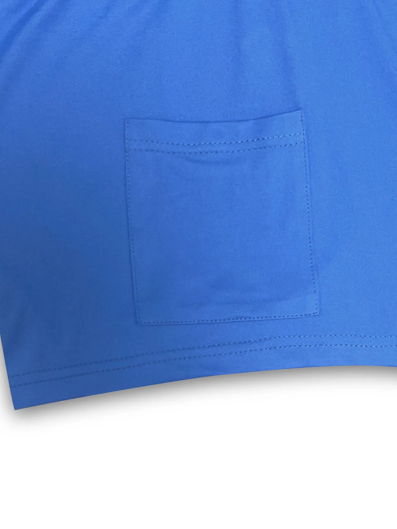 Close-up of a blue shirt with a pocket on a white background