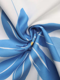 Close-up of blue and white fabric with floral pattern