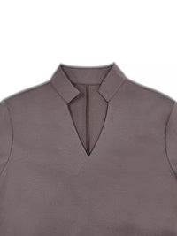 Gray sleeveless top with a collar on a white background