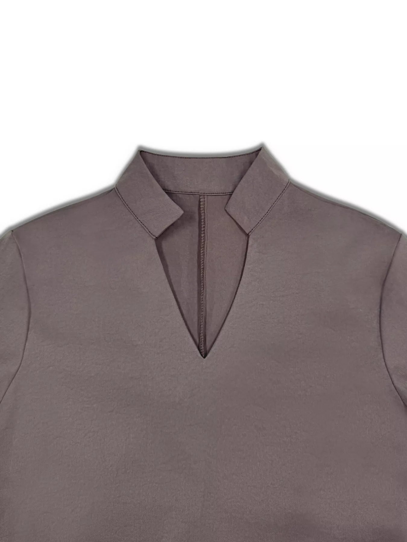 Gray sleeveless top with a collar on a white background