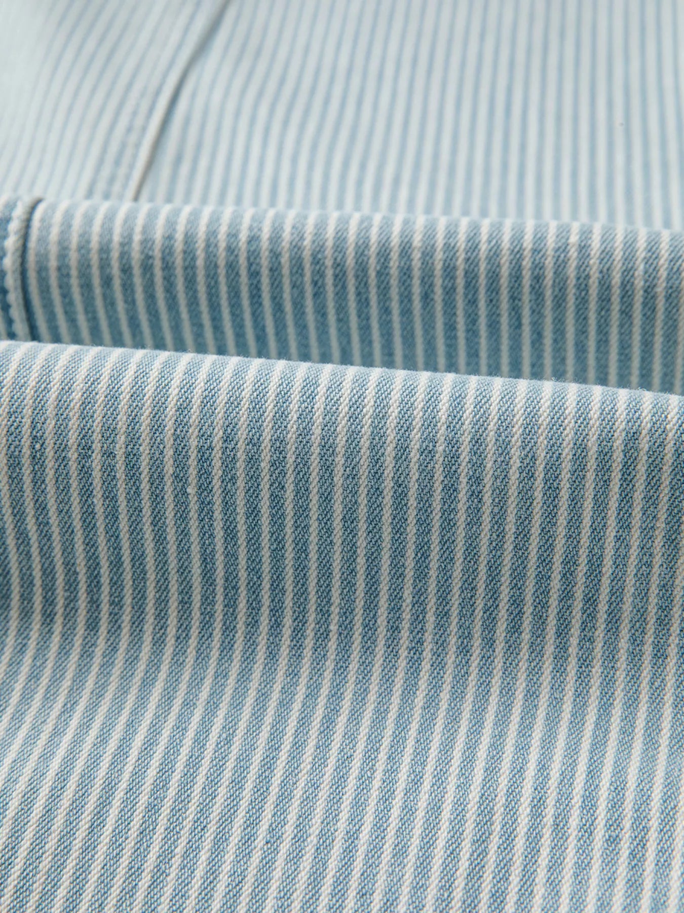 Close-up of blue and white striped fabric