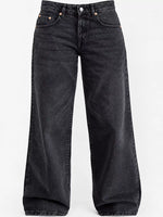 Black wide-leg denim jeans with a faded wash, shown from the front against a plain white background.