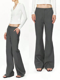 Two people wearing gray wide-leg pants on a white background