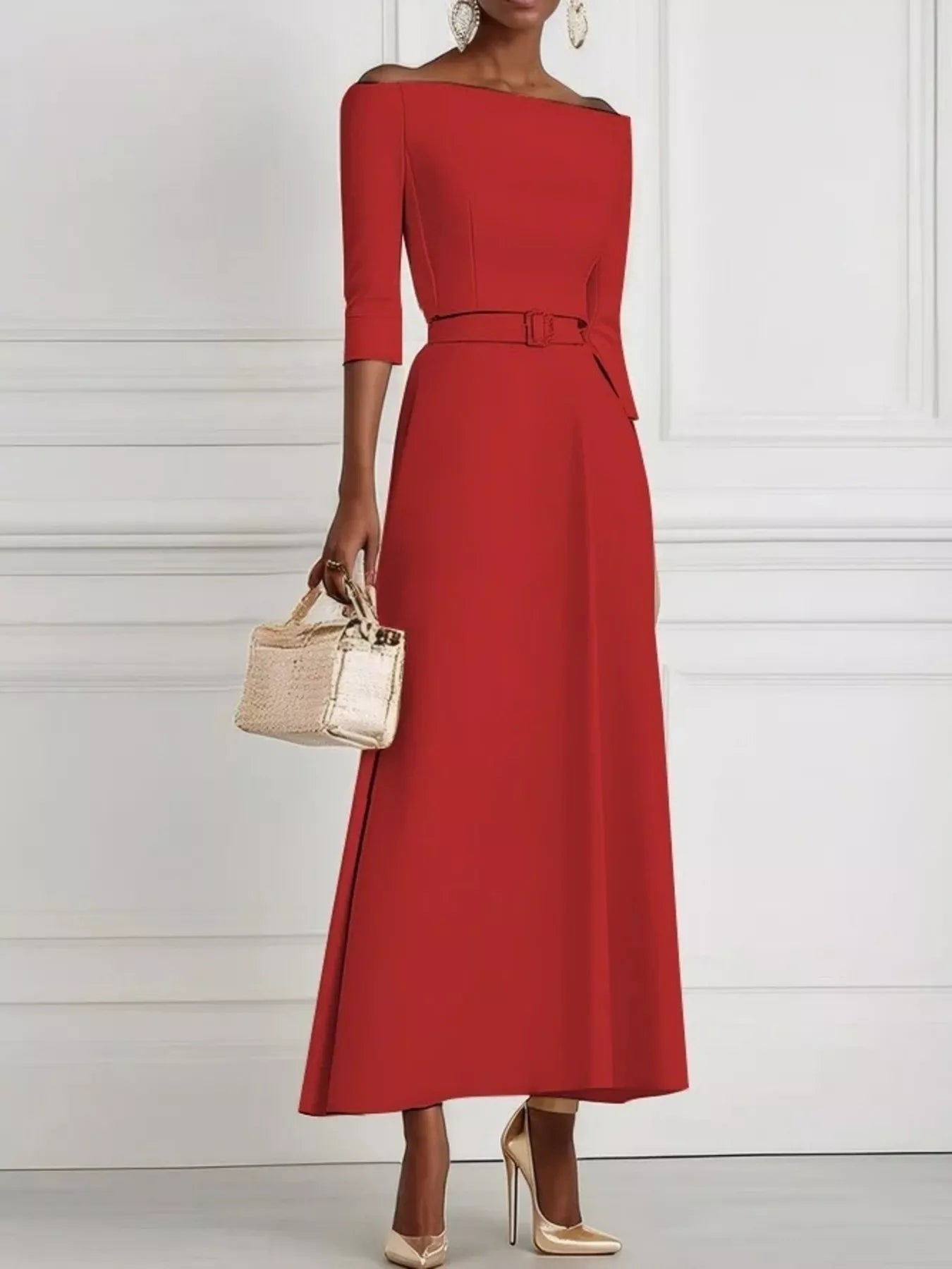 Red dress with a belt and beige handbag on a white background