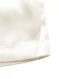 Close-up of a textured white fabric surface