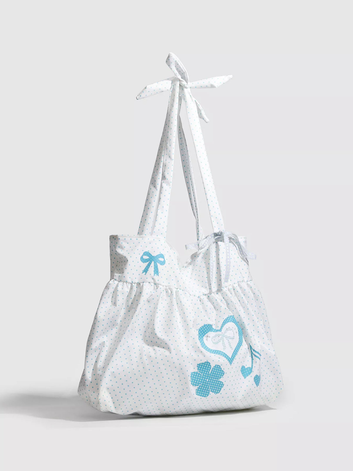 White bag with blue designs on a light gray background