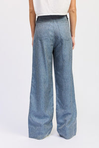 Wide-leg jeans worn by a person on a white background