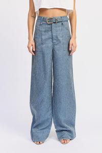 Wide-leg jeans worn by a person on a white background