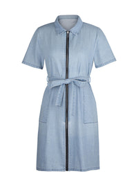 Light blue denim dress with a zipper on a white background