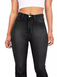 Black jeans worn by a person on a white background