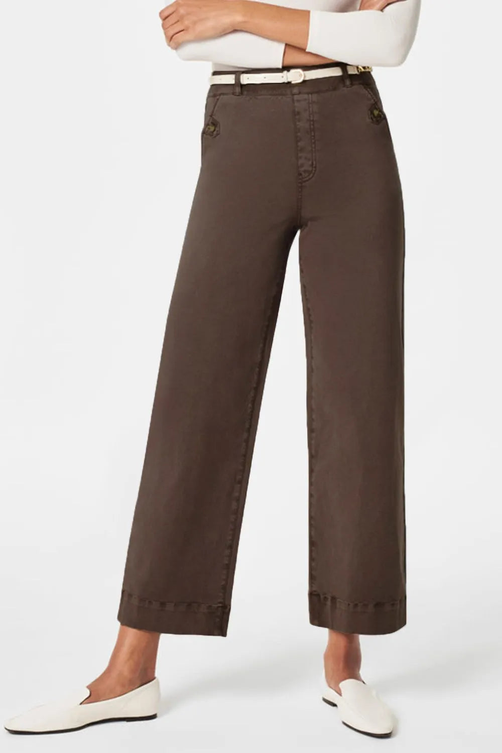 Brown wide-leg pants worn by a person on a white background