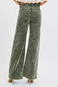 Green wide-leg jeans on a white background