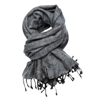 Gray scarf with tassels on a white background