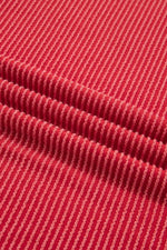 Close-up of red textured fabric