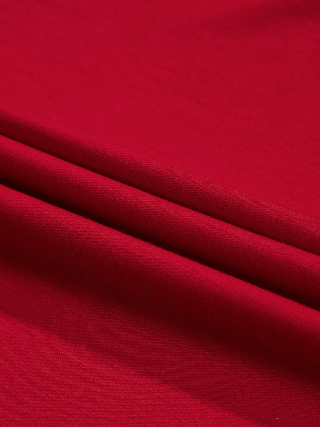 Close-up of red fabric with folds