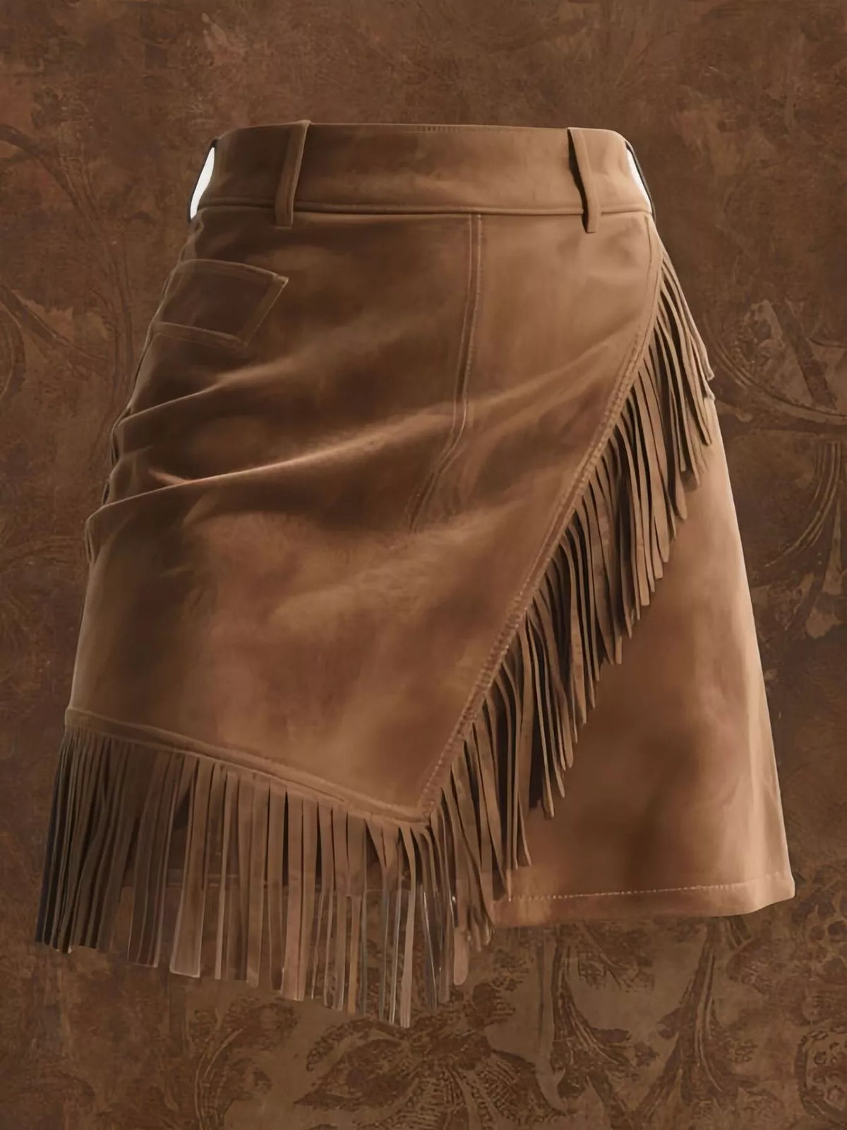 Brown leather skirt with fringe on a textured brown background