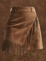 Brown leather skirt with fringe on a textured brown background