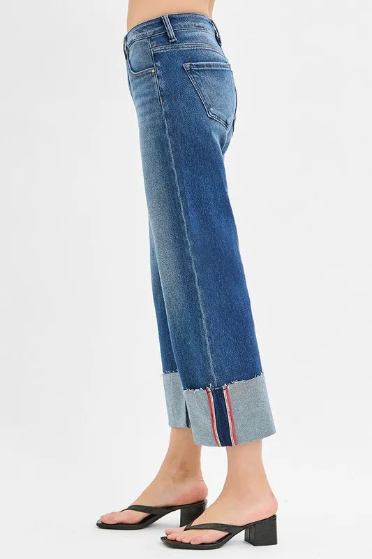 Blue jeans with a white background