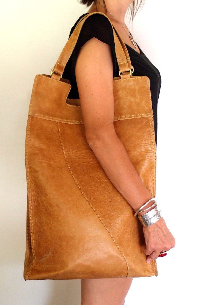 Model wearing Mi Vida Foldover Tote on her shoulder