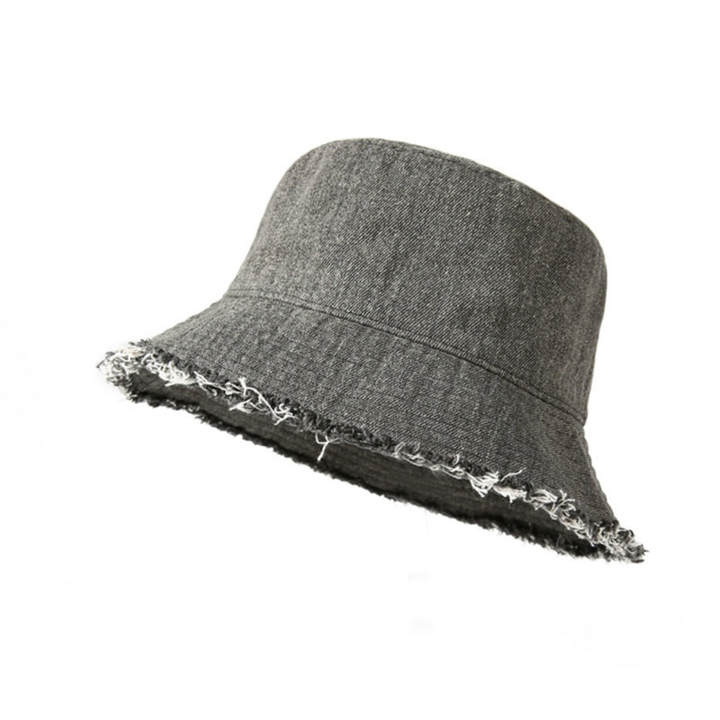 Gray bucket hat with frayed edge on a white background