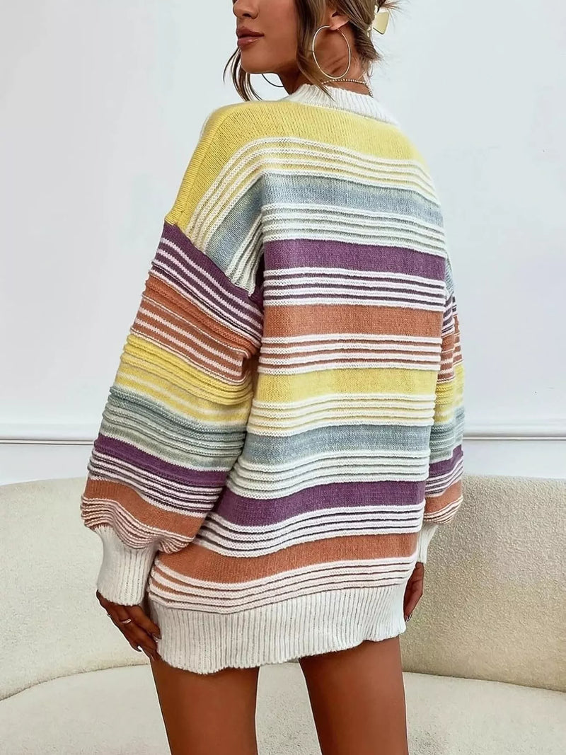 Person wearing a colorful striped sweater in a minimal indoor setting