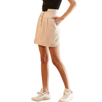 Woman showing the tight  pocket on Women's High Waisted Utility Skirt 