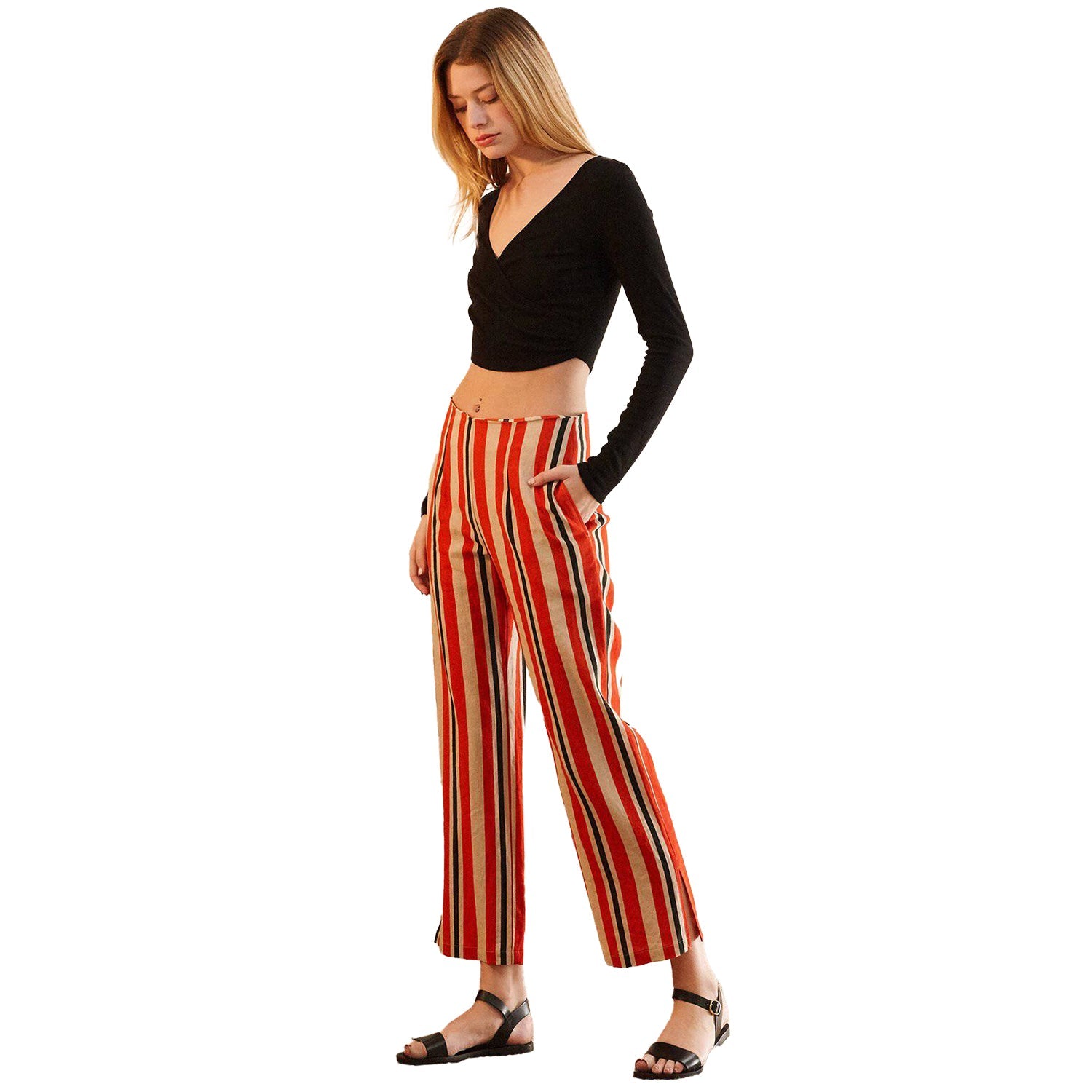 Model showing pocket on Women's Hi-waisted Cropped Pants in Poppy Multi 