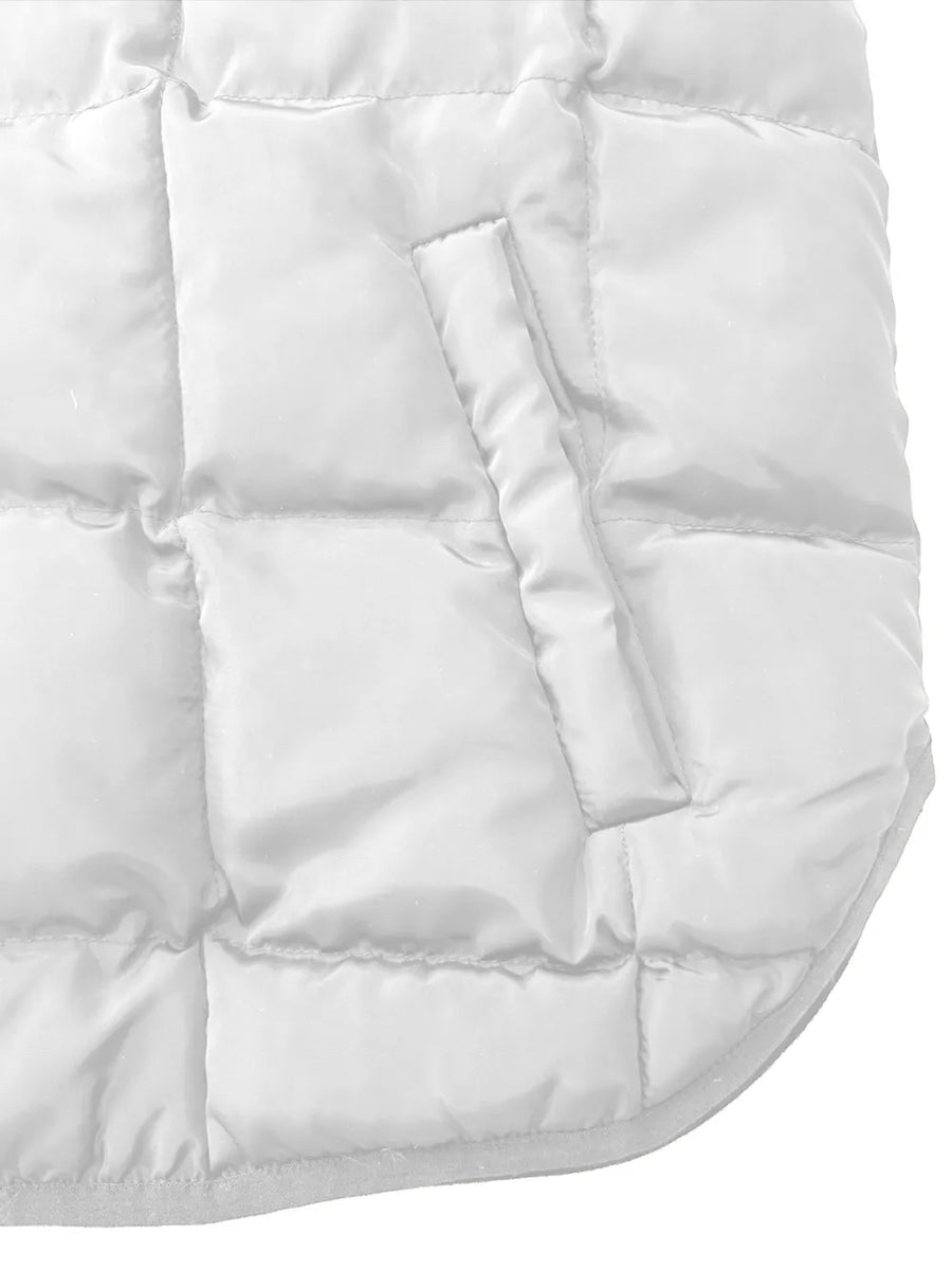 Close-up of a white quilted jacket with a focus on texture and stitching.