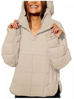 Beige puffer jacket worn by a person on a white background