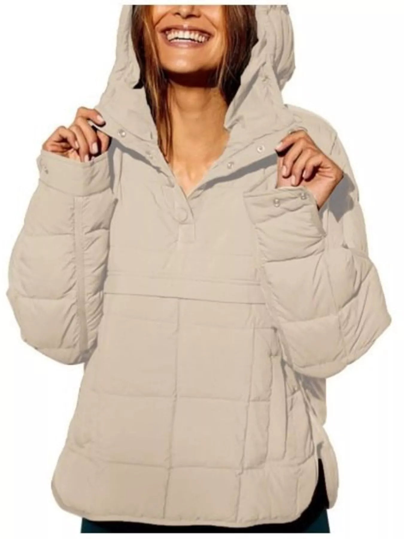 Beige puffer jacket worn by a person on a white background