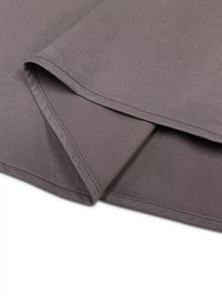 Close-up of gray fabric with a subtle texture on a white background