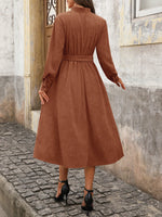 Model showing the back of Max-Origin dress