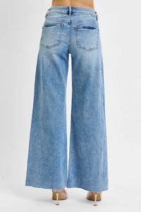 Light blue wide-leg jeans on a white background