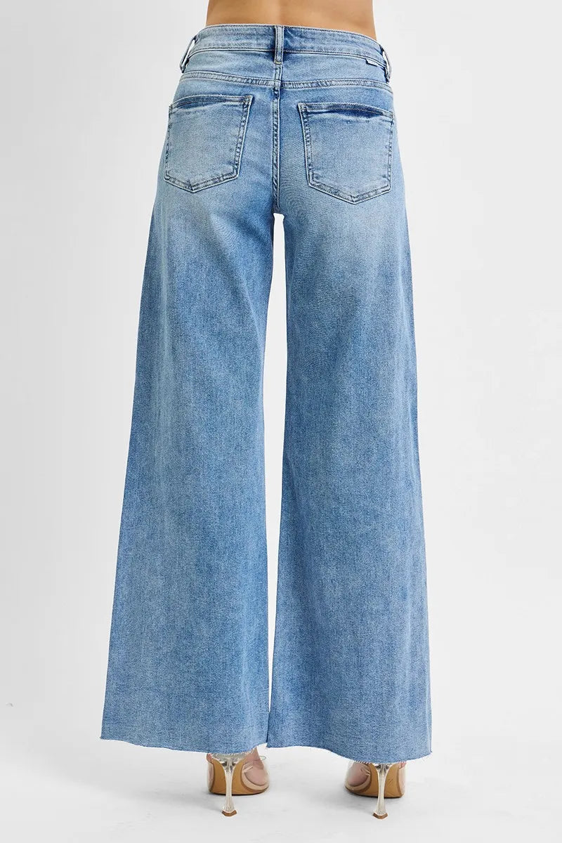 Light blue wide-leg jeans on a white background