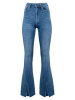 Blue flared jeans on a white background