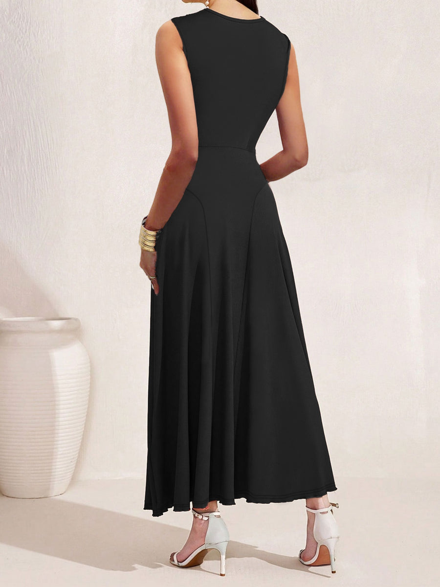 Black dress worn by a person on a white background