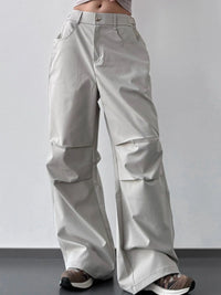 Light gray wide-leg pants worn by a person on a plain background