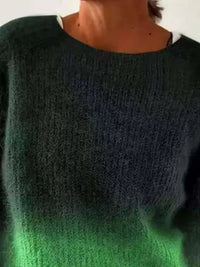 Green and black gradient sweater worn by a person