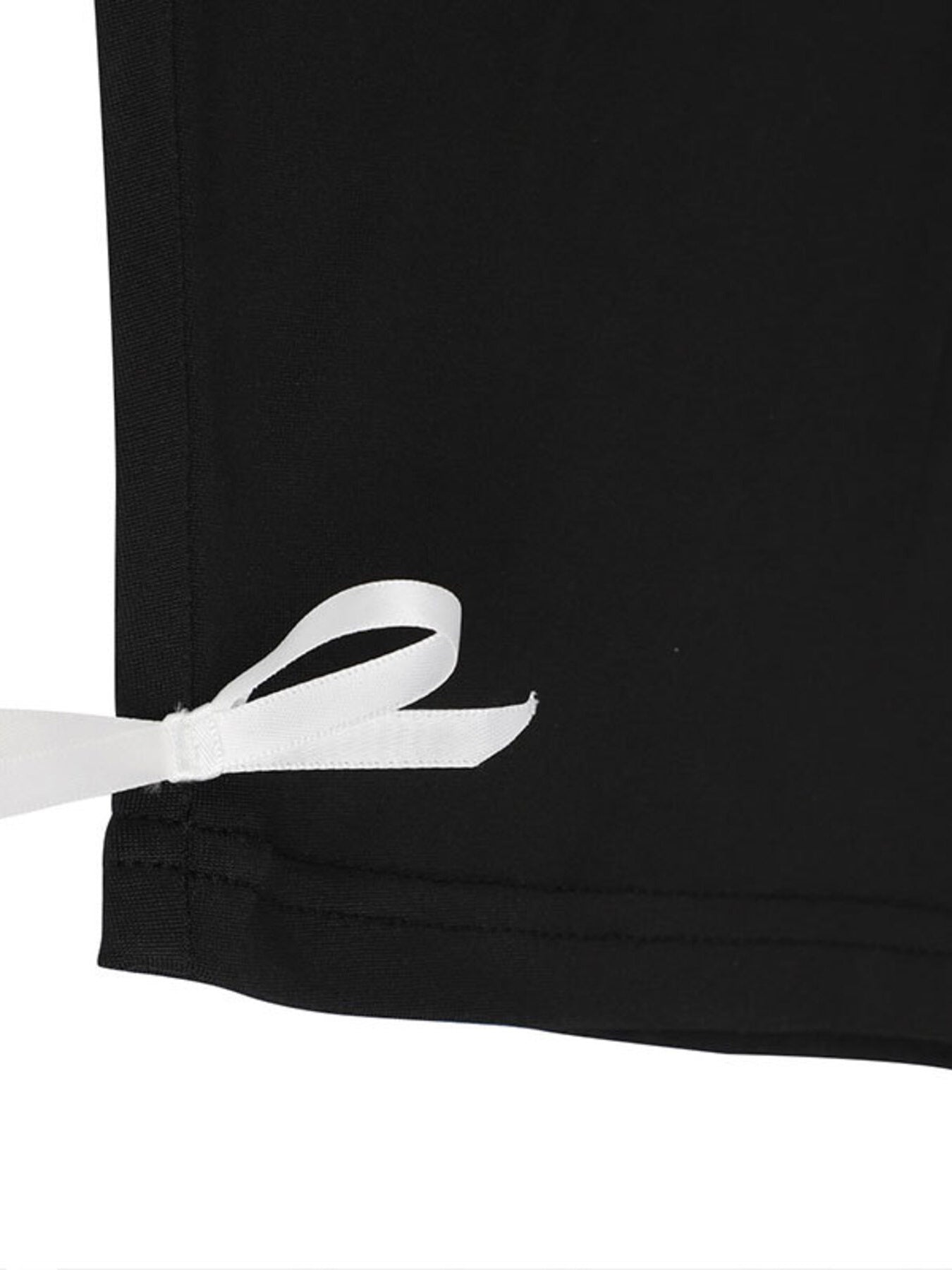 Black garment with a white ribbon detail on a white background