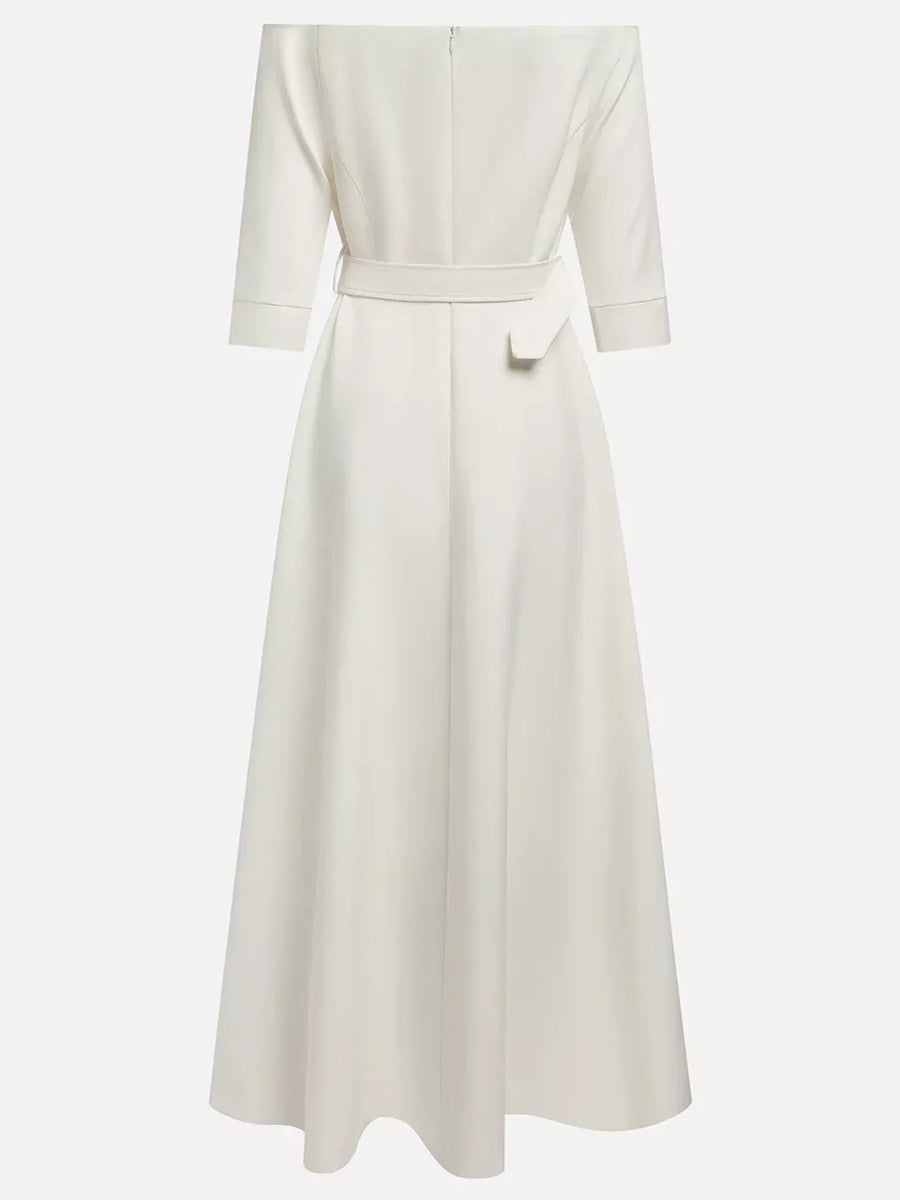 White dress with a belt on a white background