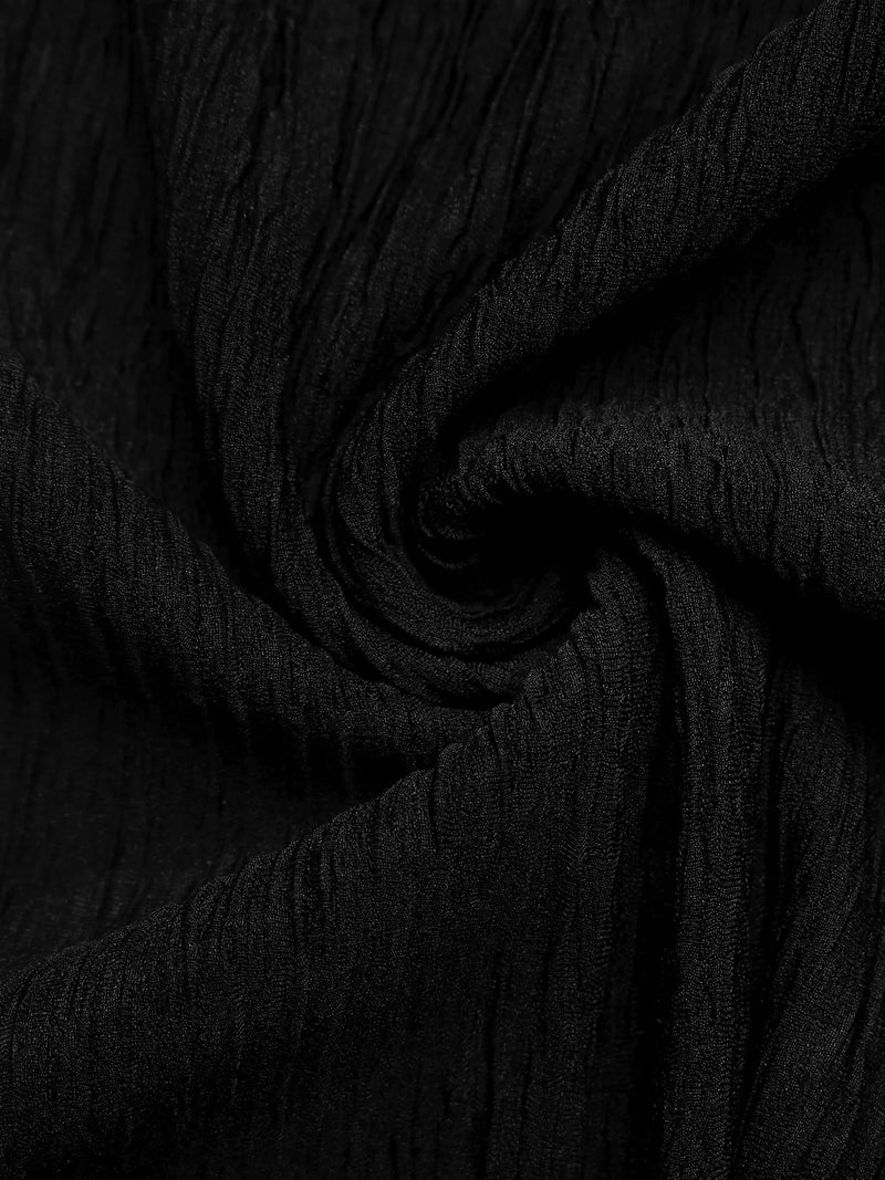 Close-up of black fabric with a textured pattern