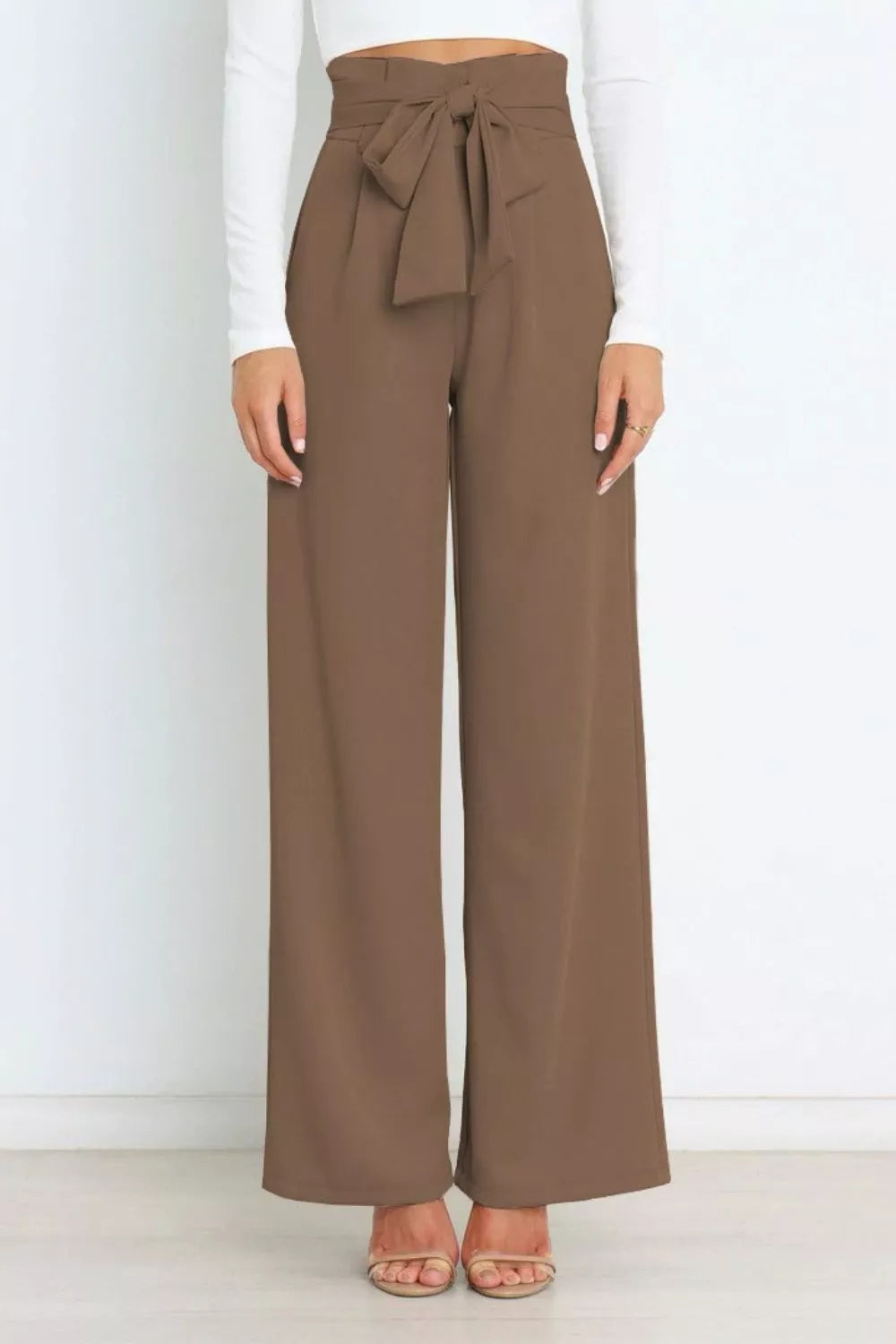 Brown wide-leg pants with a tie waist on a white background
