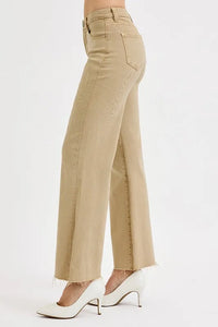 Beige wide-leg pants worn by a person on a white background