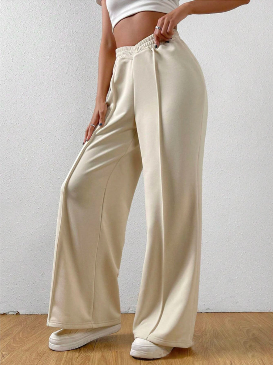 A side view of white Elastic Waist Wide Leg Jogger Pants