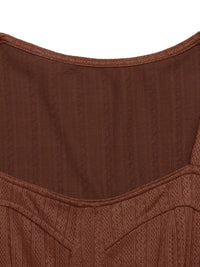 Close-up of a brown textured fabric garment