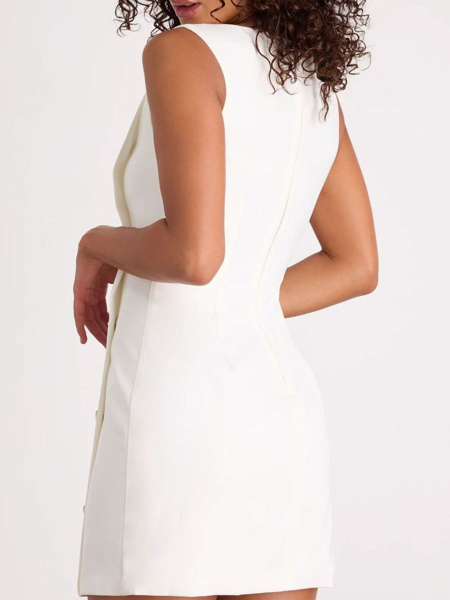 White sleeveless dress worn by a model on a white background